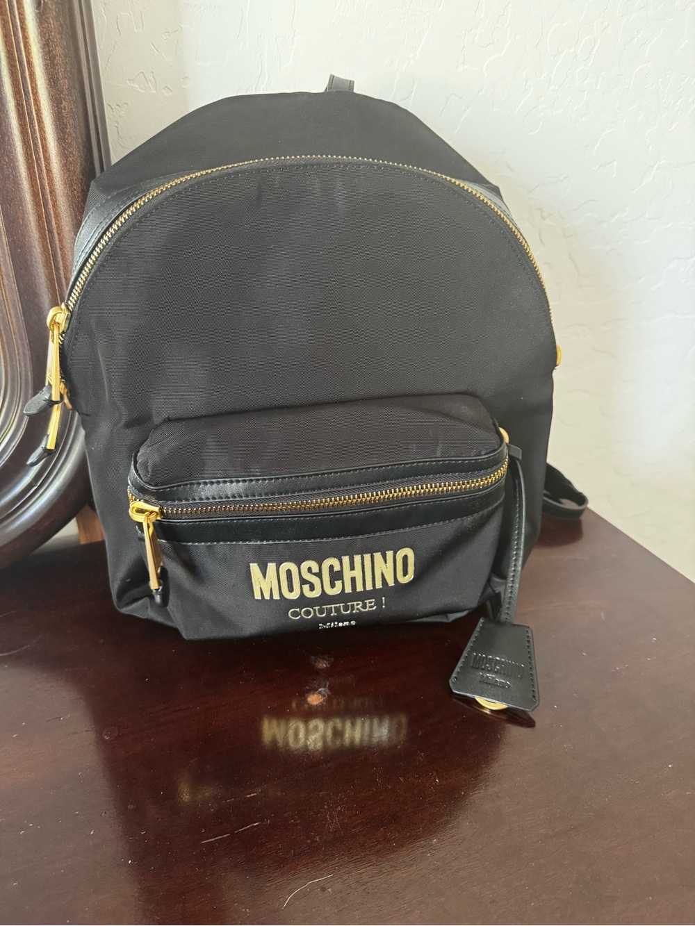 Moschino Black Backpack with Gold Hardware and Logo